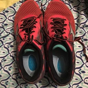 Pink and teal Mizuno